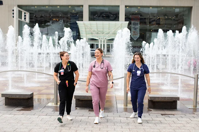 Healthcare staff outside a hospital